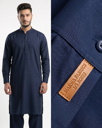 Navy kurta with a close-up of the brand label on a white background